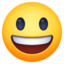 faccina con un gran sorriso e occhi spalancati Emoji (Facebook)