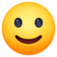 faccina con sorriso accennato Emoji (Facebook)