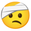 față cu capul bandajat Emoji (Google)