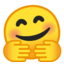 visage qui fait un câlin Emoji (Google)