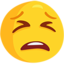 vermoeid gezicht Emoji (Messenger)