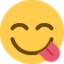 lachend gezicht dat lippen likt Emoji (Twitter, TweetDeck)